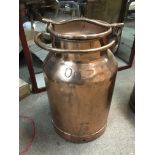 A copper churn.