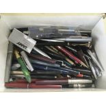 A box of mixed pens.