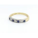 An 18ct half eternity princess cut sapphire and di