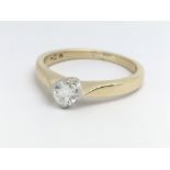 A 9ct yellow gold and diamond solitaire ring, appr