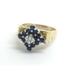 An 18ct yellow gold sapphire and diamond cluster r