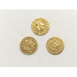 Three 10ct gold Mexican coins, width of each appro
