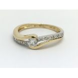 An 18ct yellow gold and diamond eternity ring, app