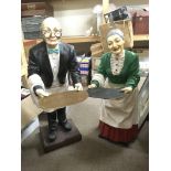 A pair of fibreglass restaurant figures of a waite