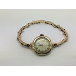 A 9ct gold cased watch, approx total weight 20.3g.