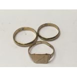 Two gold rings marked (333) and a gents 9carat gol