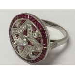 A large platinum ruby and diamond Dress ring with