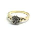 An 18ct yellow gold and diamond cluster ring, appr
