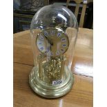 A Kein brass and glass dome anniversary clock - NO