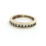 A 9ct yellow gold and diamond half eternity ring,