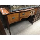 An Edwardian mahogany dressing table.