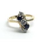 A 1950â€™s yellow gold ring, set with two sapphire