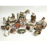 A collection of 19 Royal Crown Derby paperweights