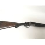 A deactivated double barrel shot gun by Thomas Evans with walnut stock. With a quality engraved