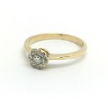 A gold seven stone diamond cluster ring, size appr