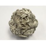 A Chinese Early 20th carved ivory ball. diameter 5