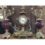 A gilt metal clock set of classical influences the