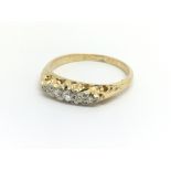 A vintage 18ct yellow gold and five stone diamond