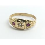 A vintage 18ct yellow gold diamond and ruby ring,