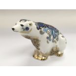 A Crown Derby polar bear paperweight with gold sto