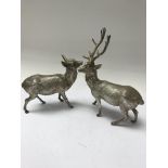 A pair of cast silver stag and doe London hallmark