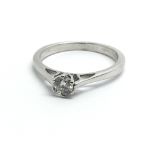 An 18ct white gold and diamond solitaire ring, app