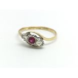 An 18ct yellow gold ruby and diamond ring, approx
