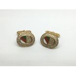A pair of 18ct gold diamond and enamel cufflinks,
