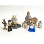 A quantity of porcelain figures including Beswick,