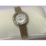 A ladies Rotary Elite G 9ct gold and diamond set b