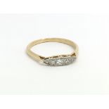 An 18ct yellow gold vintage ring having five small