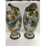 A pair of 1950s Belgian art vases decorated with b