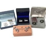 Four pairs of boxed cuff links