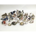 A collection of 25 Royal Crown Derby paperweights