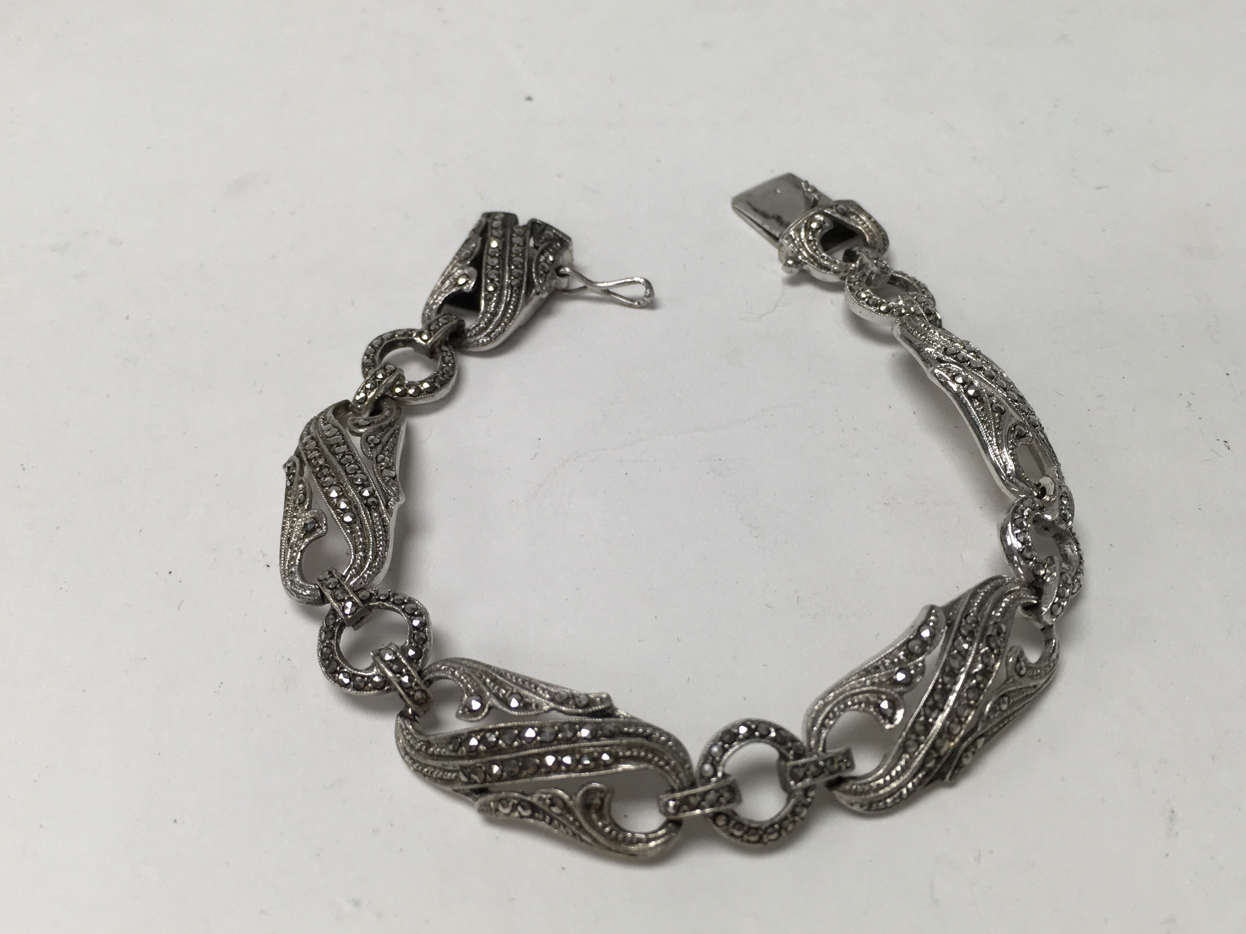 A sterling silver and marcasite set bracelet.