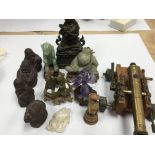 A collection of oriental jade type figures other o