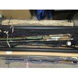Another collection of fishing rods and equipment.