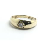 A gents 9ct yellow gold and diamond solitaire ring