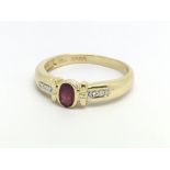 An 18ct yellow gold ruby and small diamond ring, s