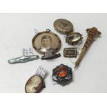 A collection of brooches a small framed miniature
