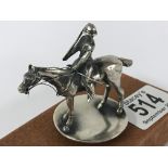 A hallmarked silver Polo player on horseback