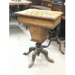 A walnut games table with inset chess board top.