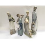 Four Lladro figures of girls, tallest approx 33cm.