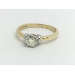 A 9ct yellow gold and diamond solitaire ring, appr