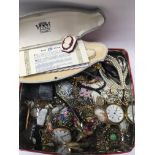 A tin of good mixed costume jewellery.