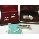 A pair of Tiffany & Co silver cuff links of a bear