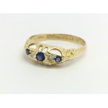 A vintage 18ct sapphire and diamond ring, approx s