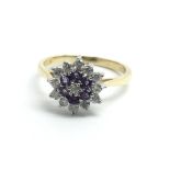 An 18ct yellow gold amethyst and diamond cluster r