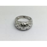 An 18ct white gold stone set band ring, approx 10g