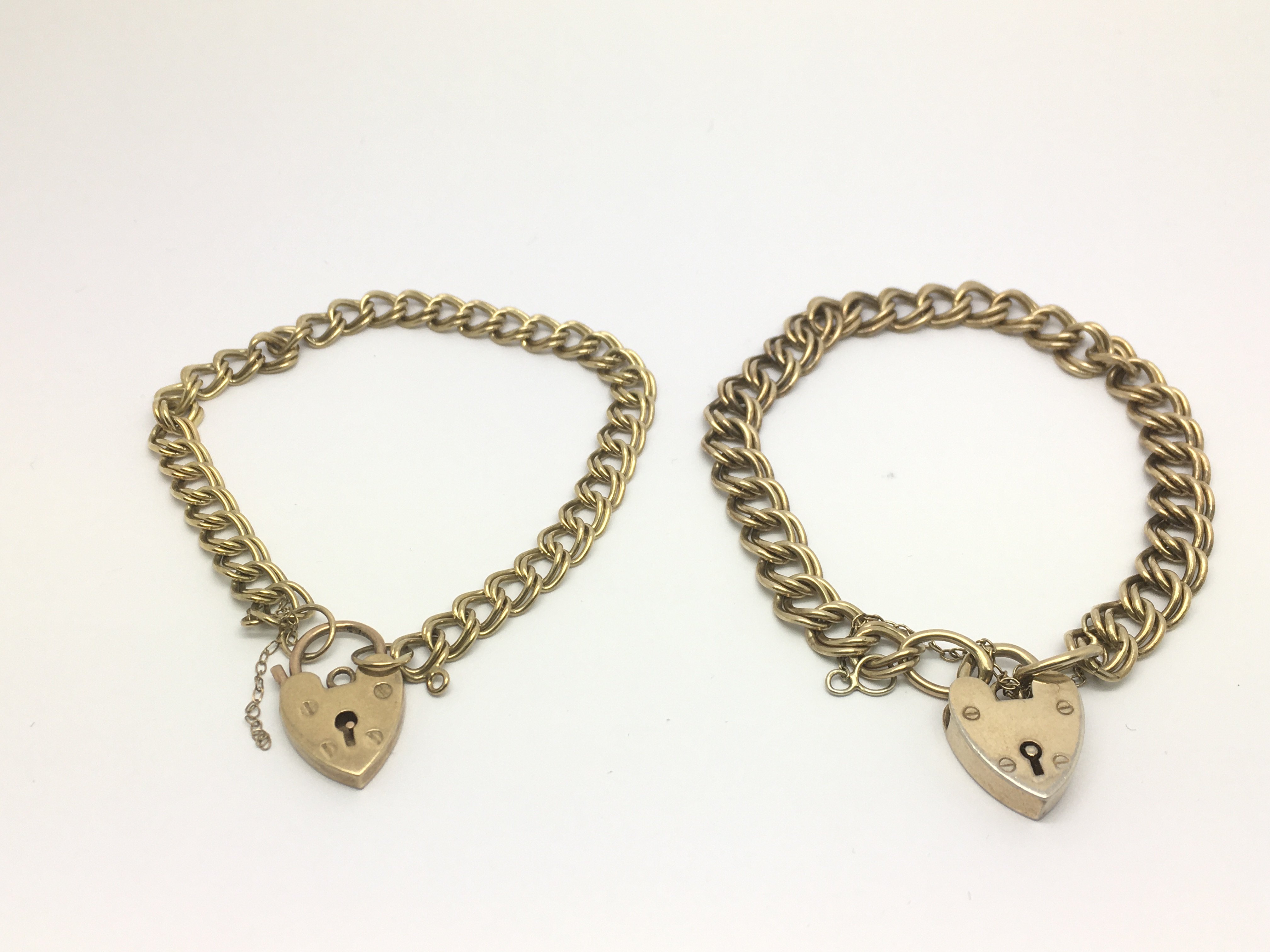 one 9ct gold bracelet with padlock clasp, plus a s